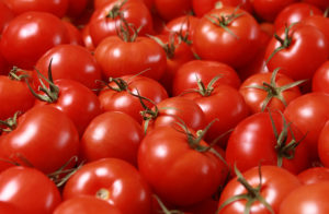 Seaside Grown Tomatoes in a bushel